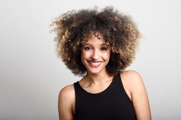 woman-smiling-face-with-curly-hair_1139-582